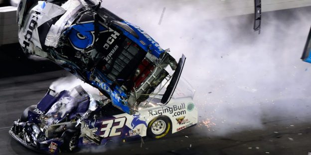 End of Daytona 500 marred by scary wreck that sent the leader up in the air and down on his roof with the car on fire