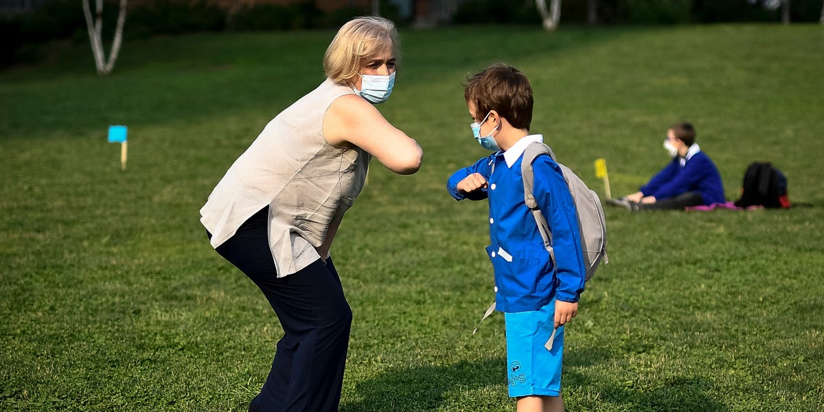 Photos show how outdoor classes and other coronavirus-fighting measures usher kids to school in relative safety around the world