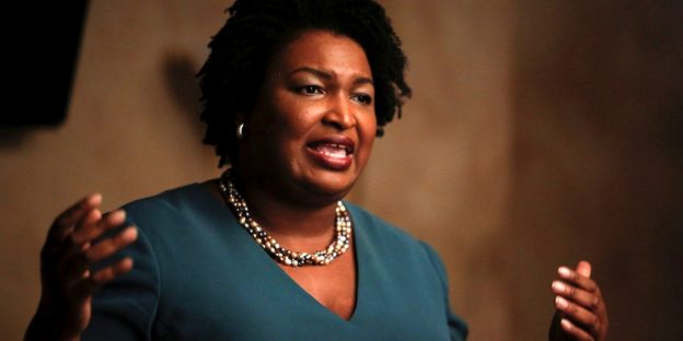 Vice presidential contender Stacey Abrams says Trump is trying to ‘steal the vote’ by undermining the US Postal Service