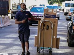 FedEx Logs Record Revenue on Surge in Packages