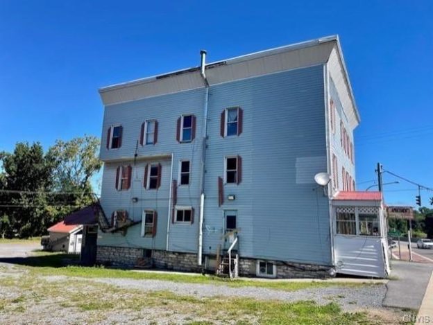 Condemned Factory Street apartment building listed for sale at $599,000