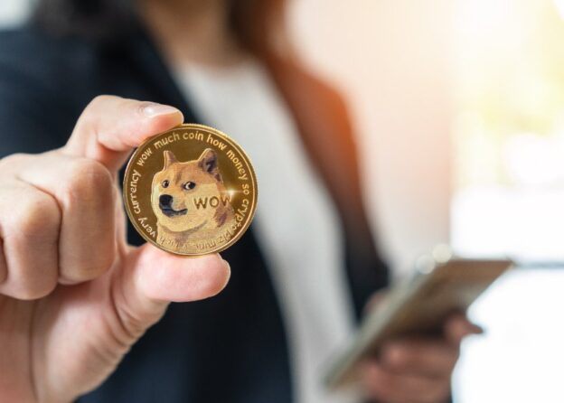 Wait for a bullish confirmation as Dogecoin retests the $0.09 support