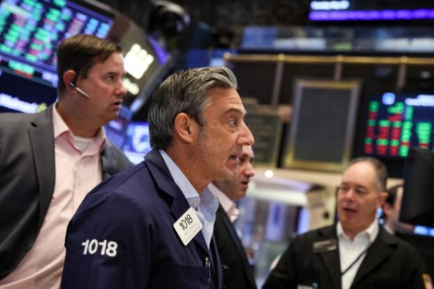 Wall Street rallies on jobs data, debt default averted