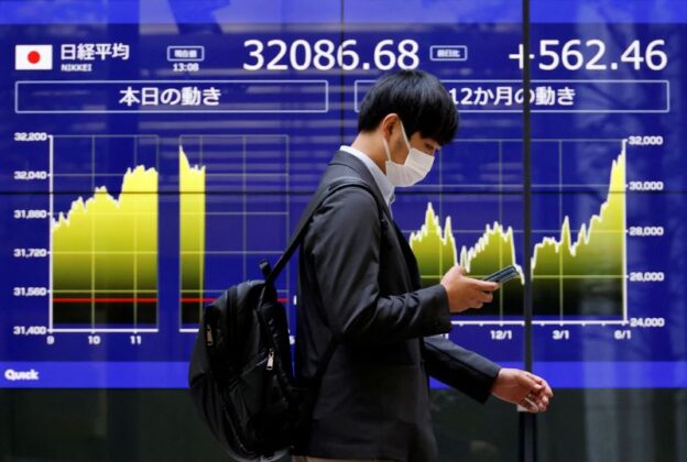 World shares touch 14-month highs as investor concern over rate hikes eases