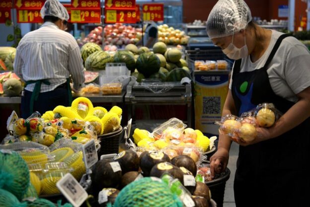 China’s consumer prices swing into decline as deflation risks build