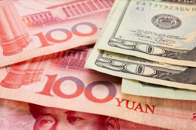 PBoC sets USD/CNY reference rate at 7.1011 vs. 7.1104 previous