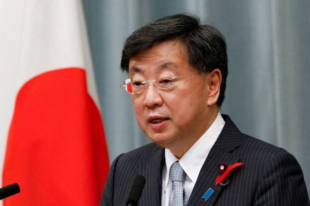 Japan PM backs minister at centre of fundraising scandal allegations