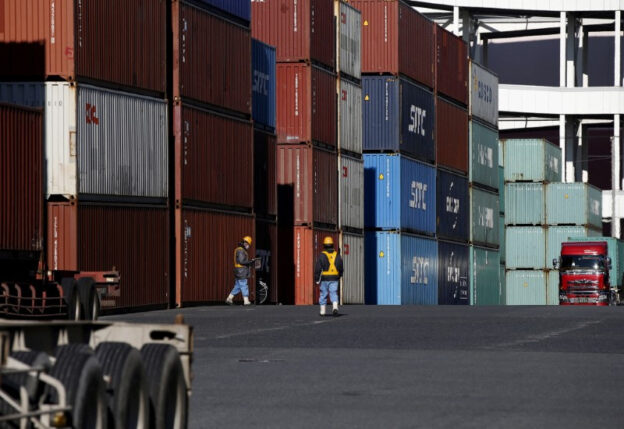 Japan’s exports rise faster than expected, helped by weaker yen