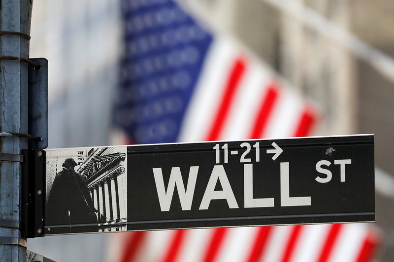 Wall Street closes lower on trade war escalation, weak data