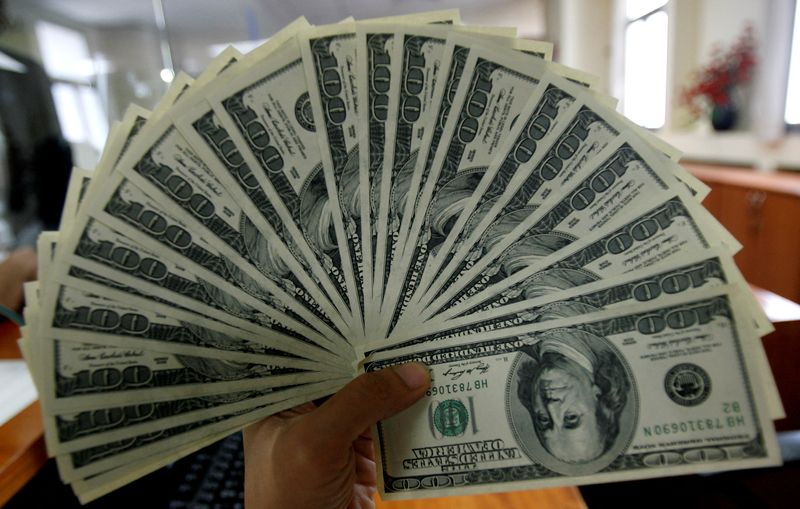 Dollar falls broadly ahead of US data, tariff uncertainty