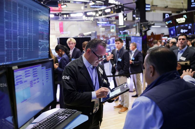 Wall Street ends higher as investors digest Trump trade comments