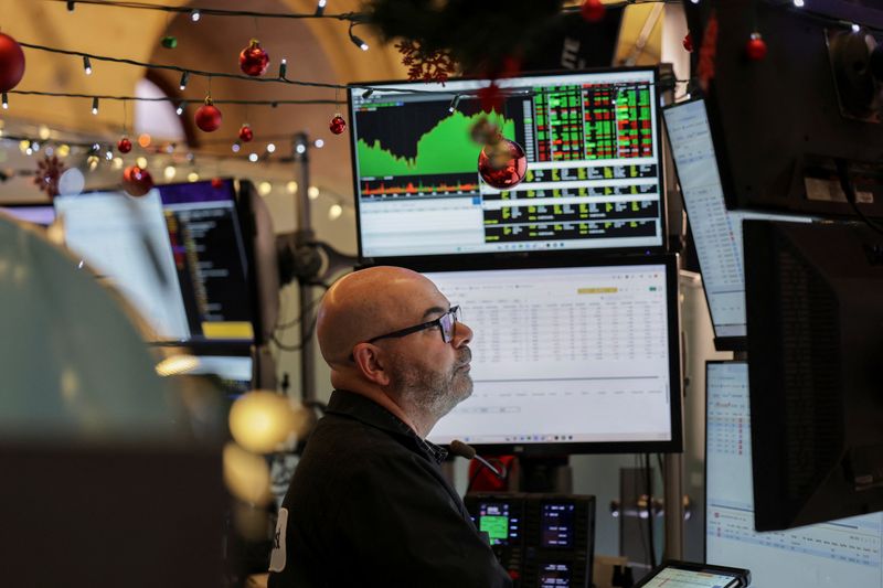 Wall St slides as inflation worries, AI bubble fears spook investors