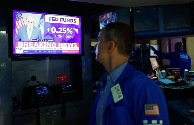 Tech leads Wall St to higher close as oil eases, Treasury yields dip